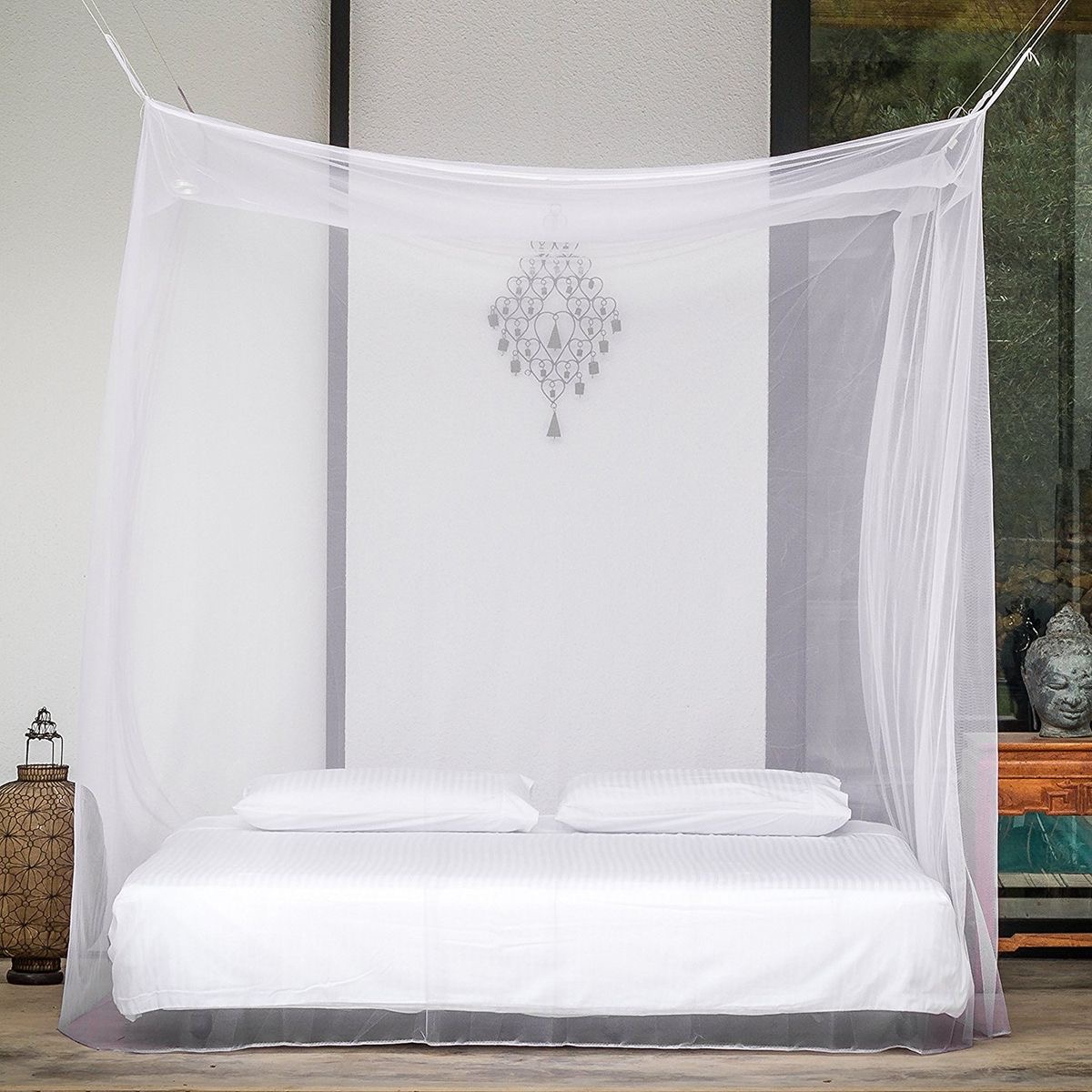 Customer bedroom with a NestHaven white canopy mosquito net